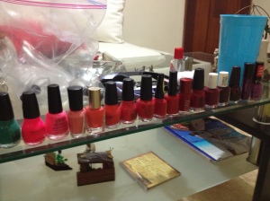 Proving to Marie that my nail polishes aren't ALL red.